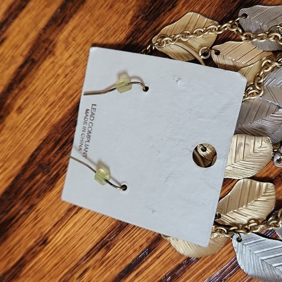 Mia Collection gold and silver leaves dangling earrings - Picture 2 of 2